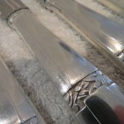 12 silver plated table knives by Argit goldsmith? Art Deco floral bands
