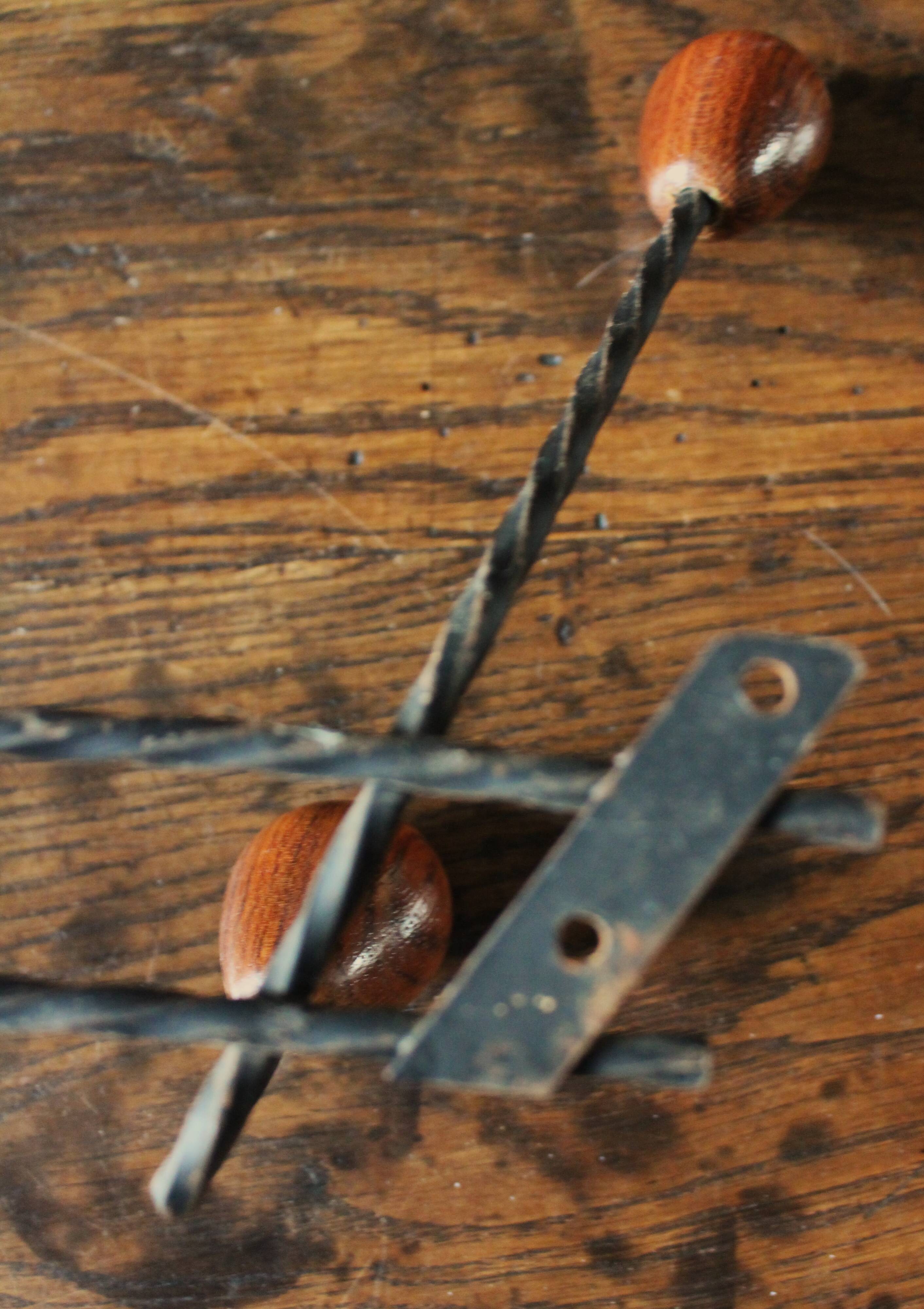 Double wrought iron coat rack with 3 double wooden ball hooks