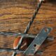 Double wrought iron coat rack with 3 double wooden ball hooks