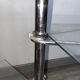 Four-tier rotating shelf in chrome metal