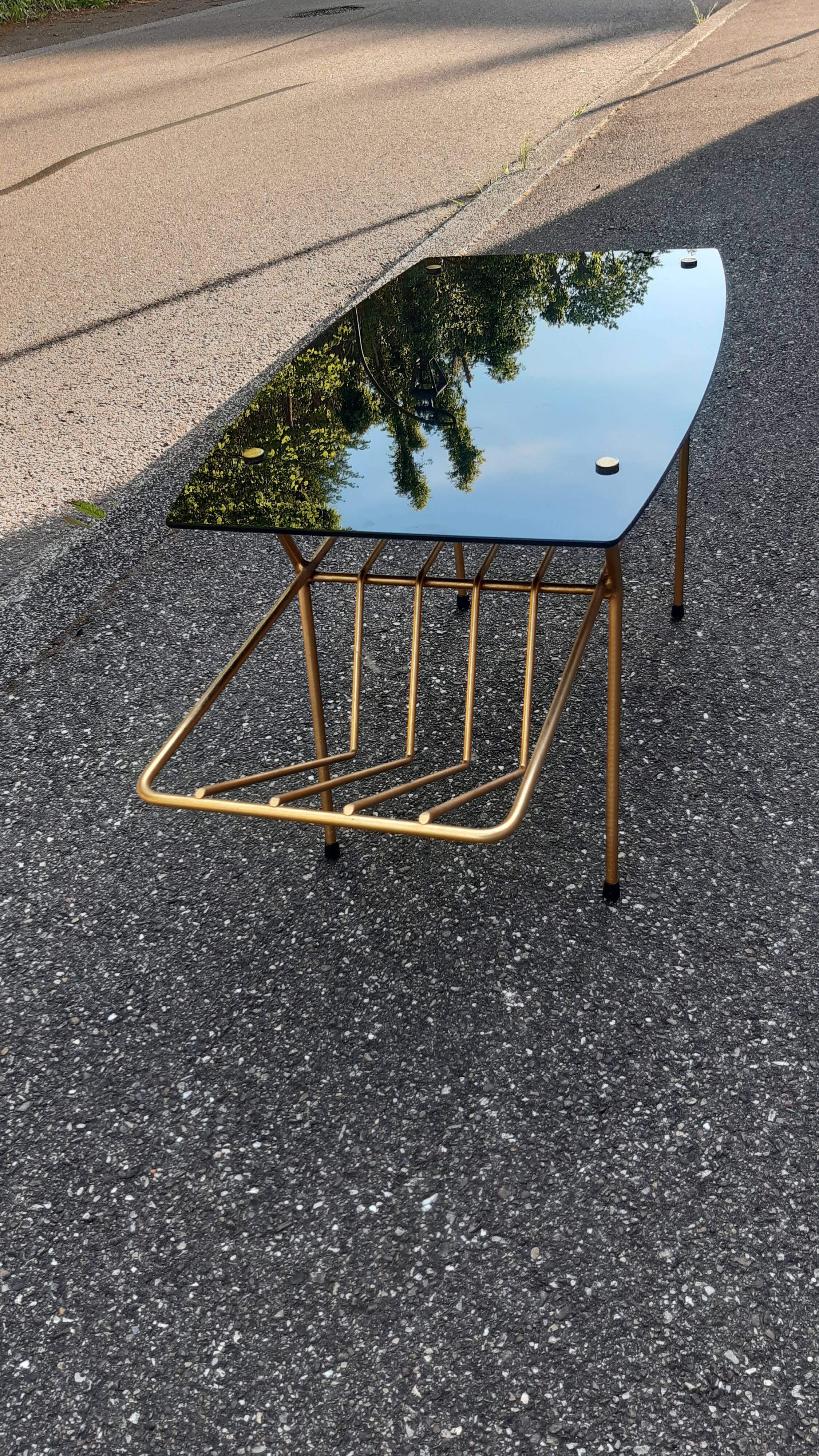 End of sofa black glass and brass 1970