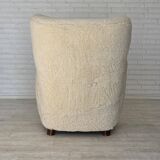 1960s, Danish armchair, genuine sheepskin "Canberra", reupholstered.