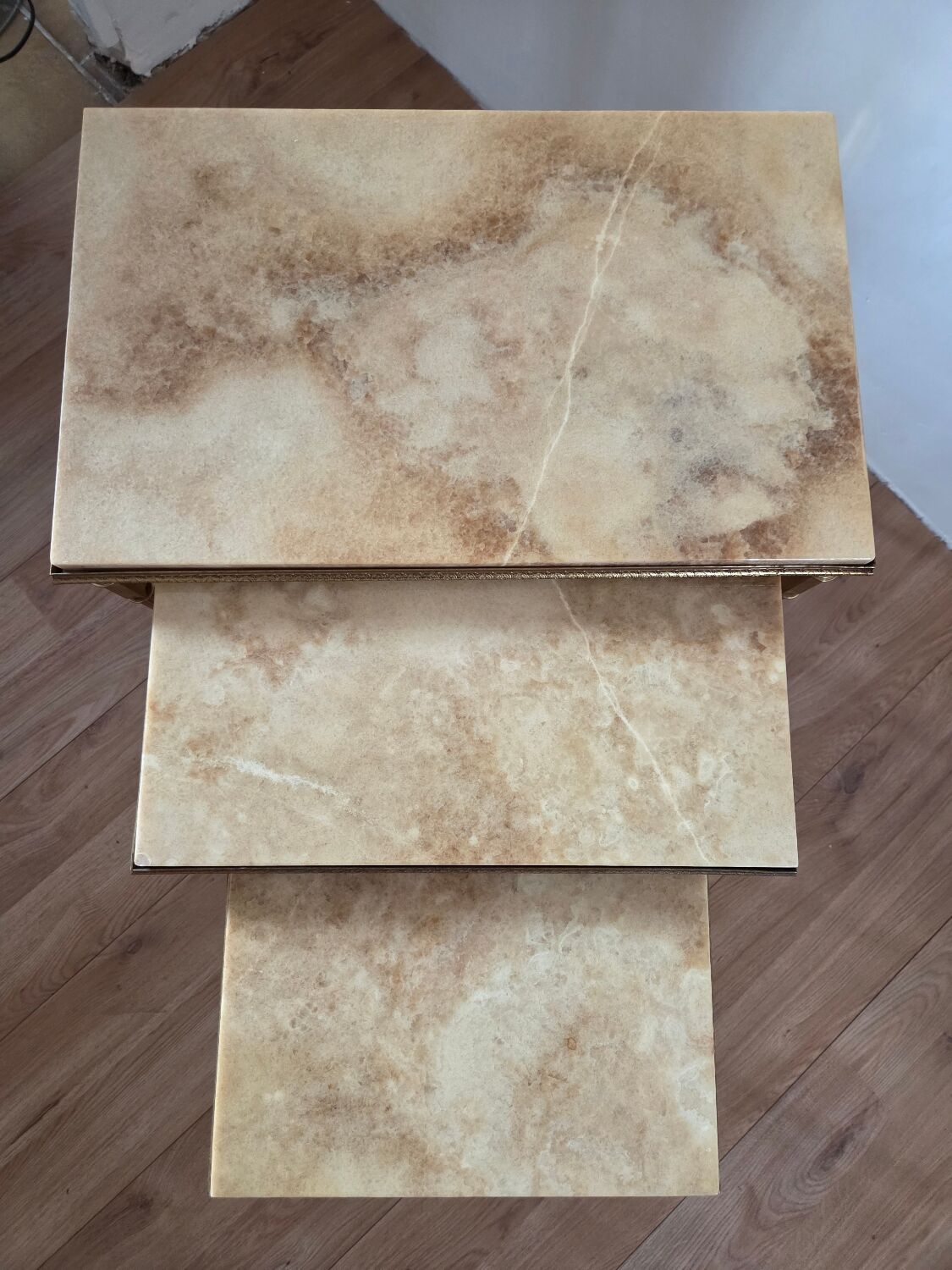 Nested tables in brass and marble, 1950.