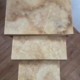 Nested tables in brass and marble, 1950.