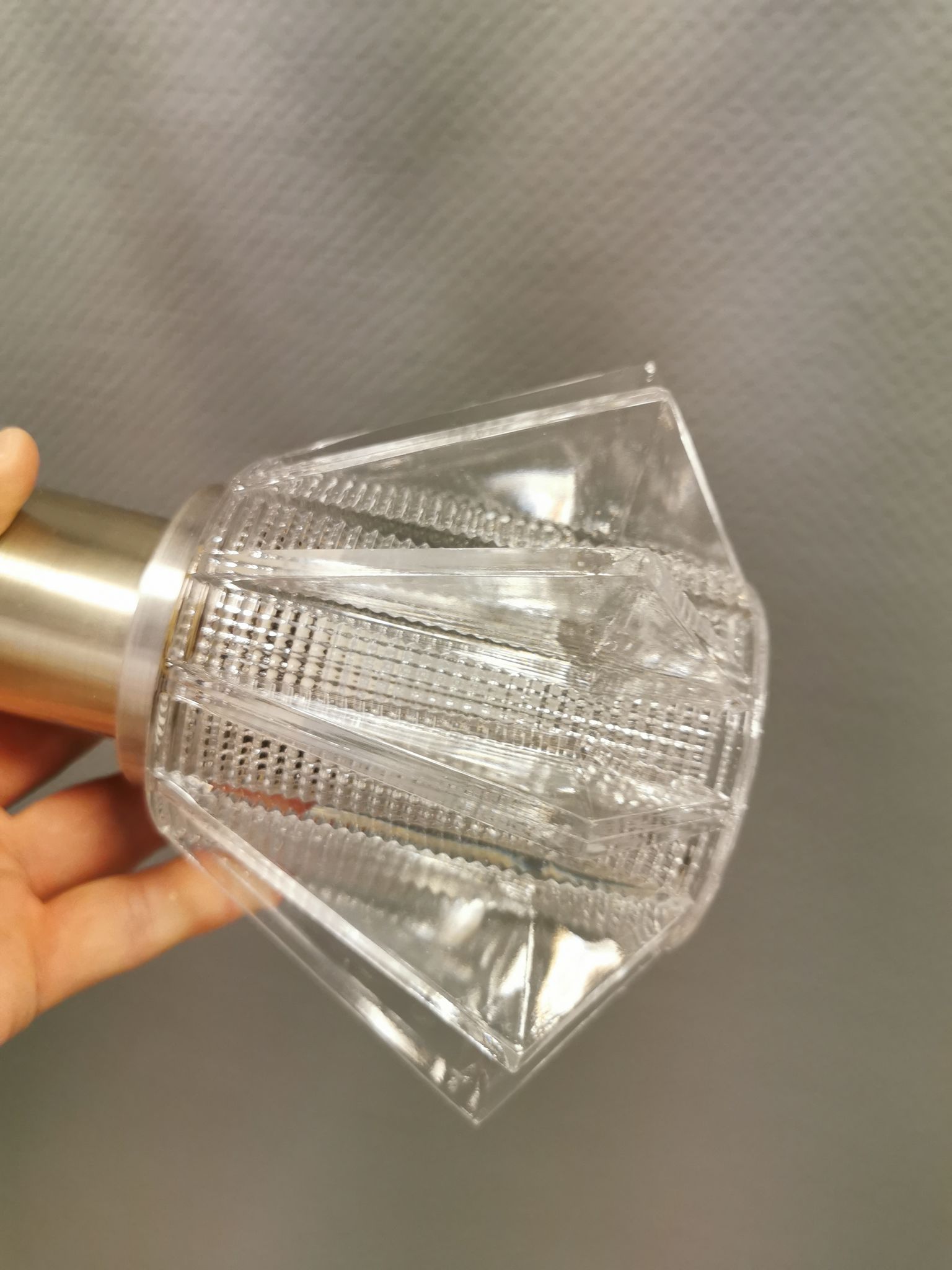 A set of smaller hanging lamps, in hard pressed glass, with metal top