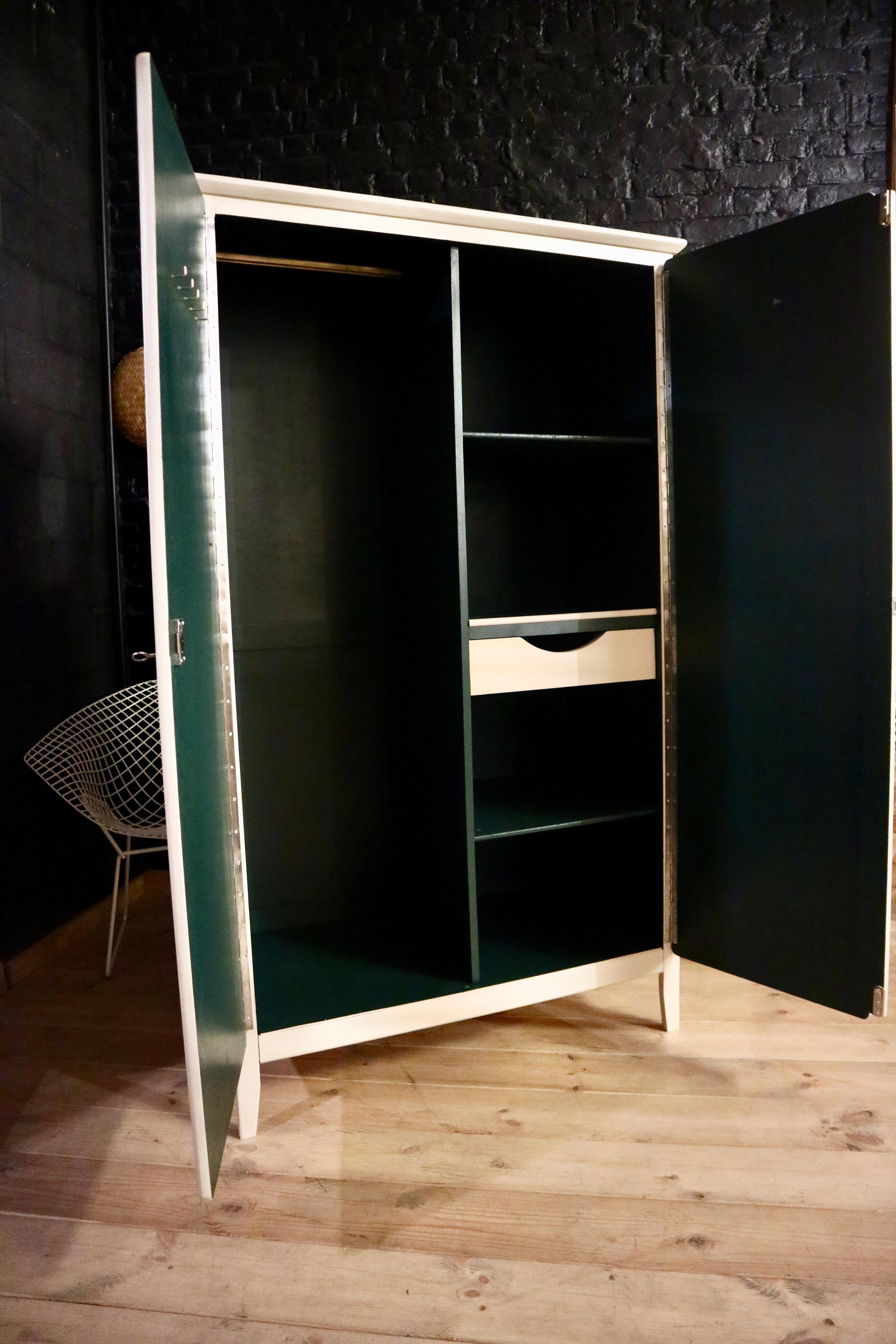 Restored parisian ivory, emerald green cabinet