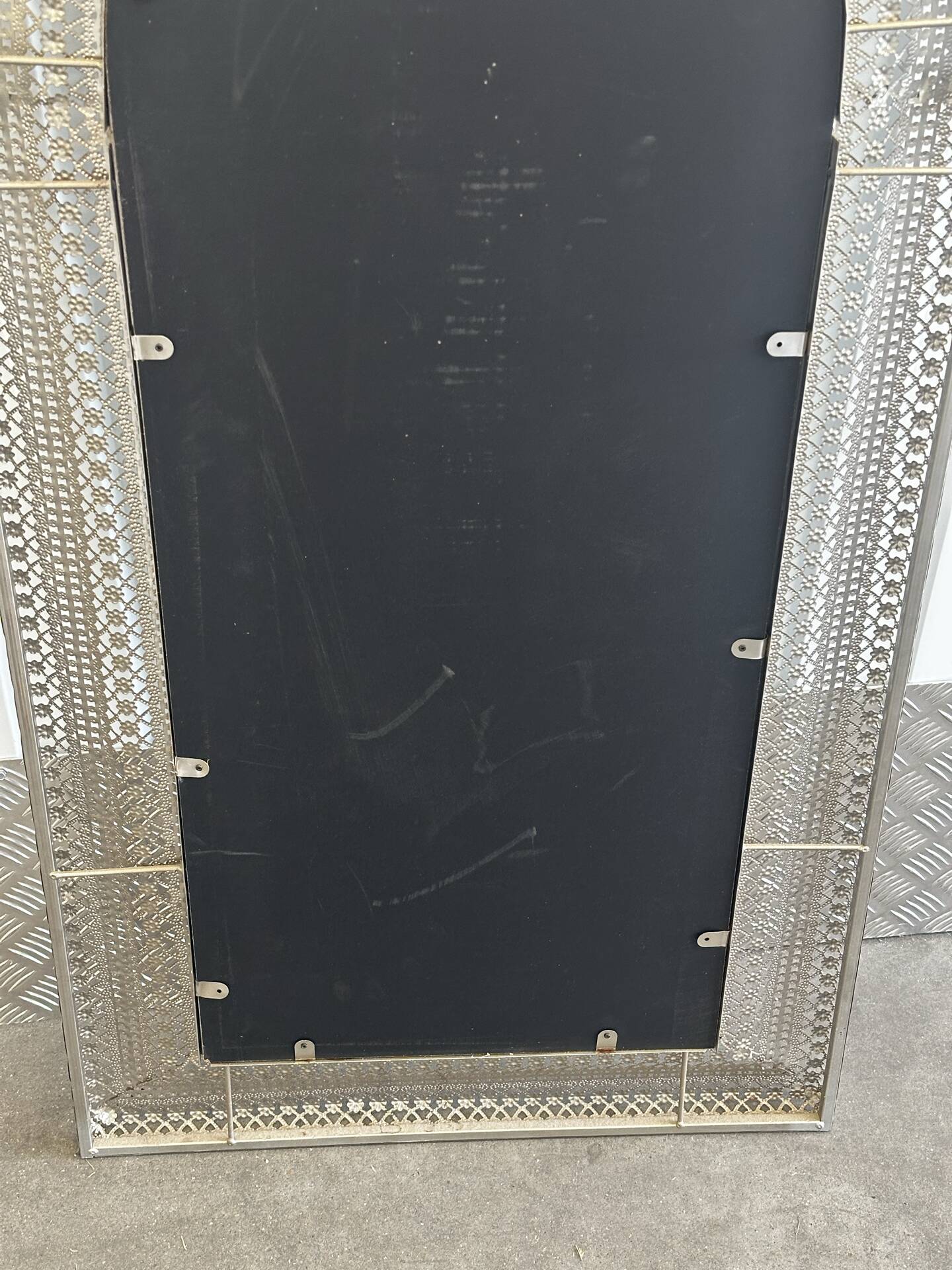 Large oriental mirror in pierced metal - H 116 cm