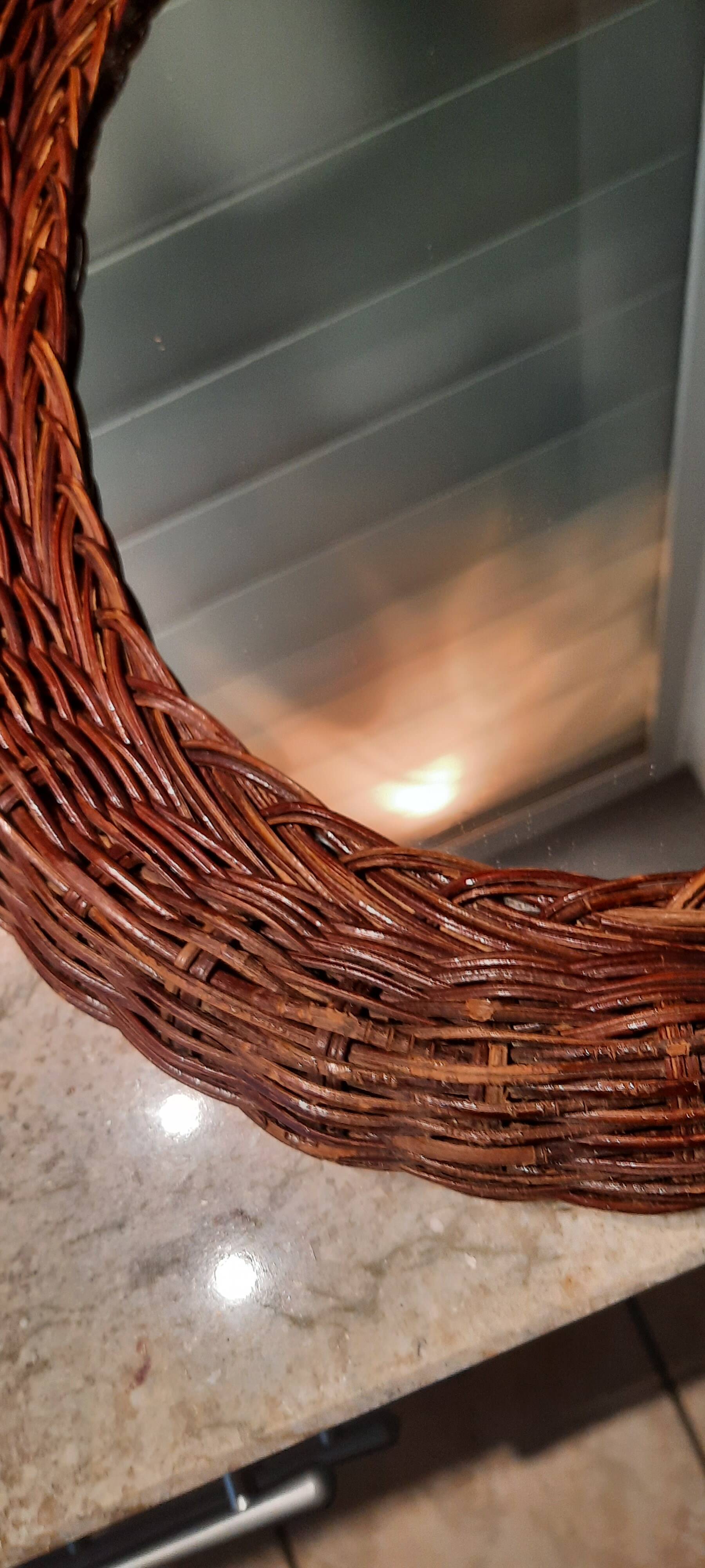 Vintage woven wicker oval mirror