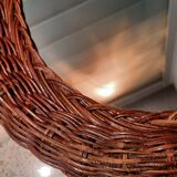 Vintage woven wicker oval mirror