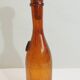 Amber bottle in bubbled blown glass, signed Biot – France, vintage 1970s