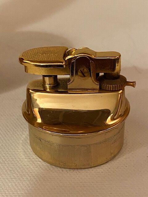 Table lighter, ball-shaped gold color