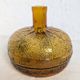 Bouteille en verre ambré texturé forme orange