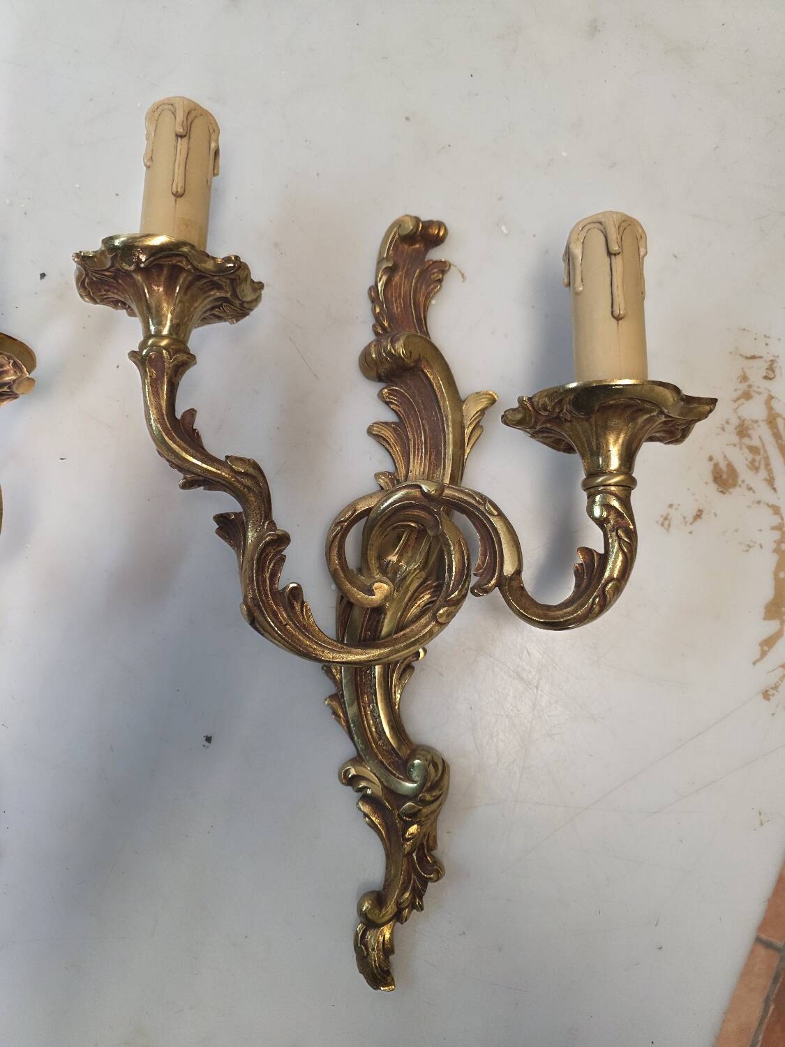 Pair of Louis XV style bronze wall sconces