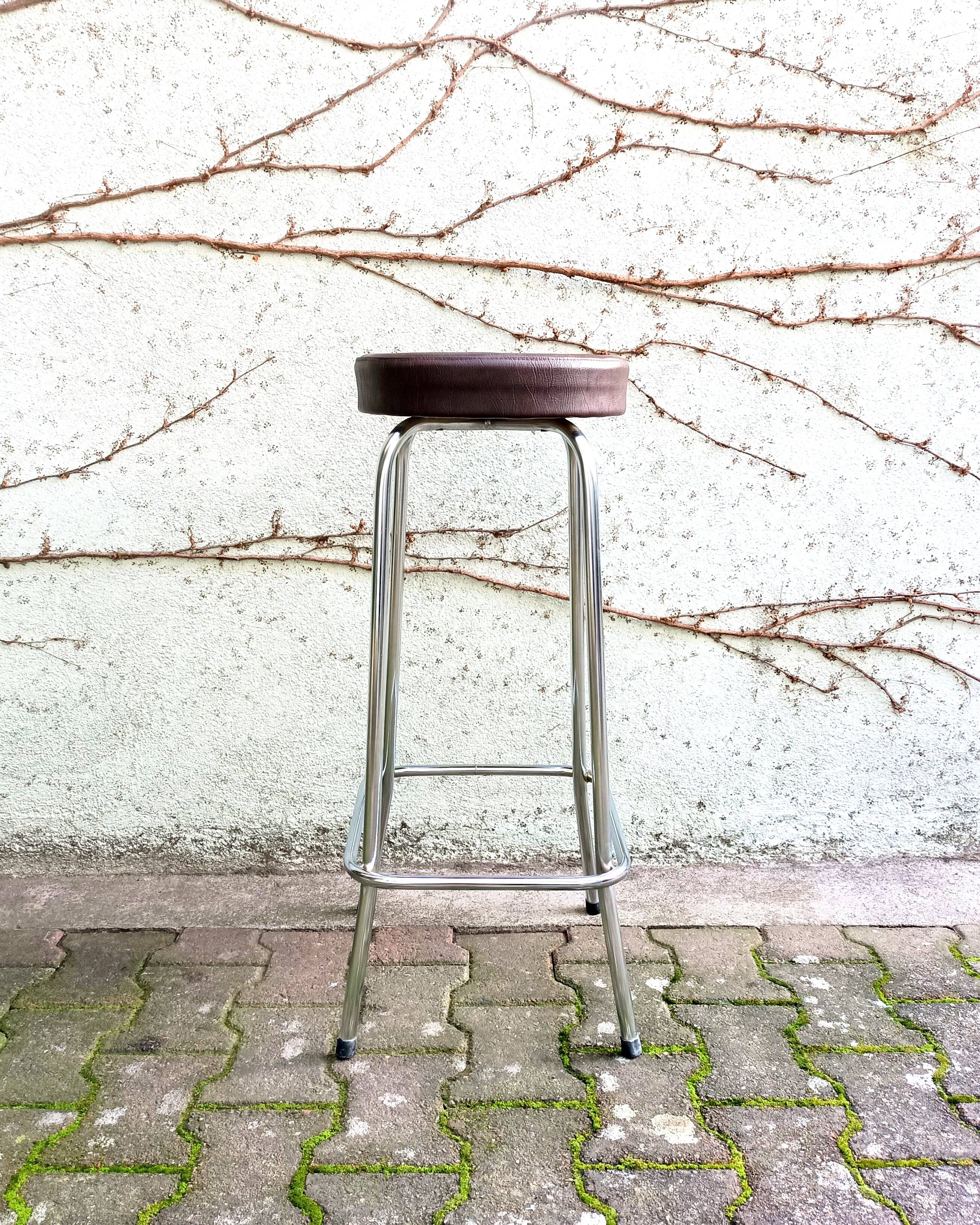 Metal and faux leather bar stool