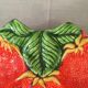 Vintage strawberry-shaped beggar or servant
