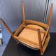 A Scandinavian teak skai chair from the 1960s for a vintage desk table.