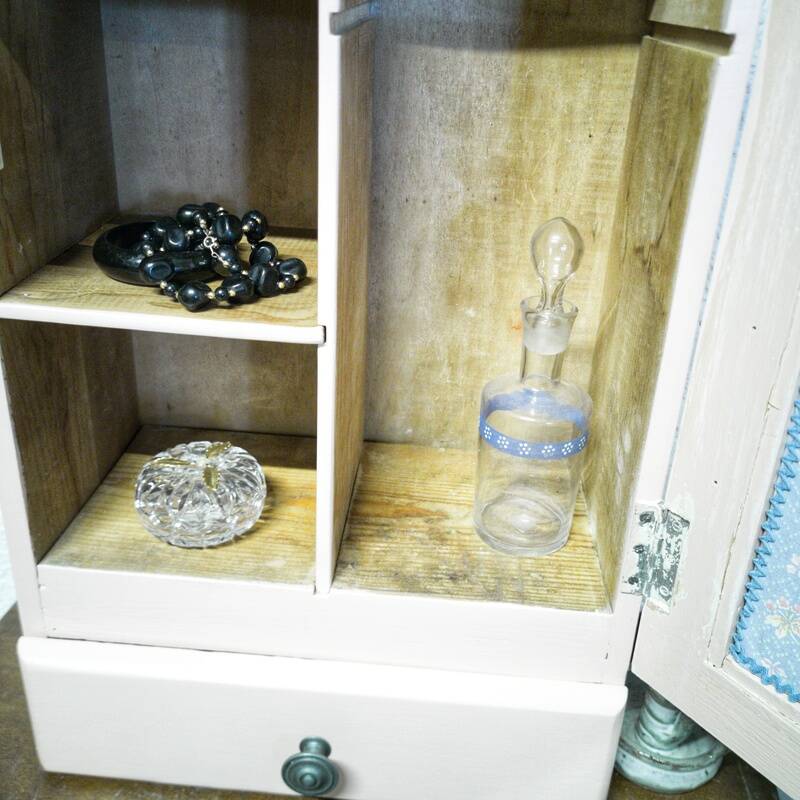 Pink bathroom cabinet