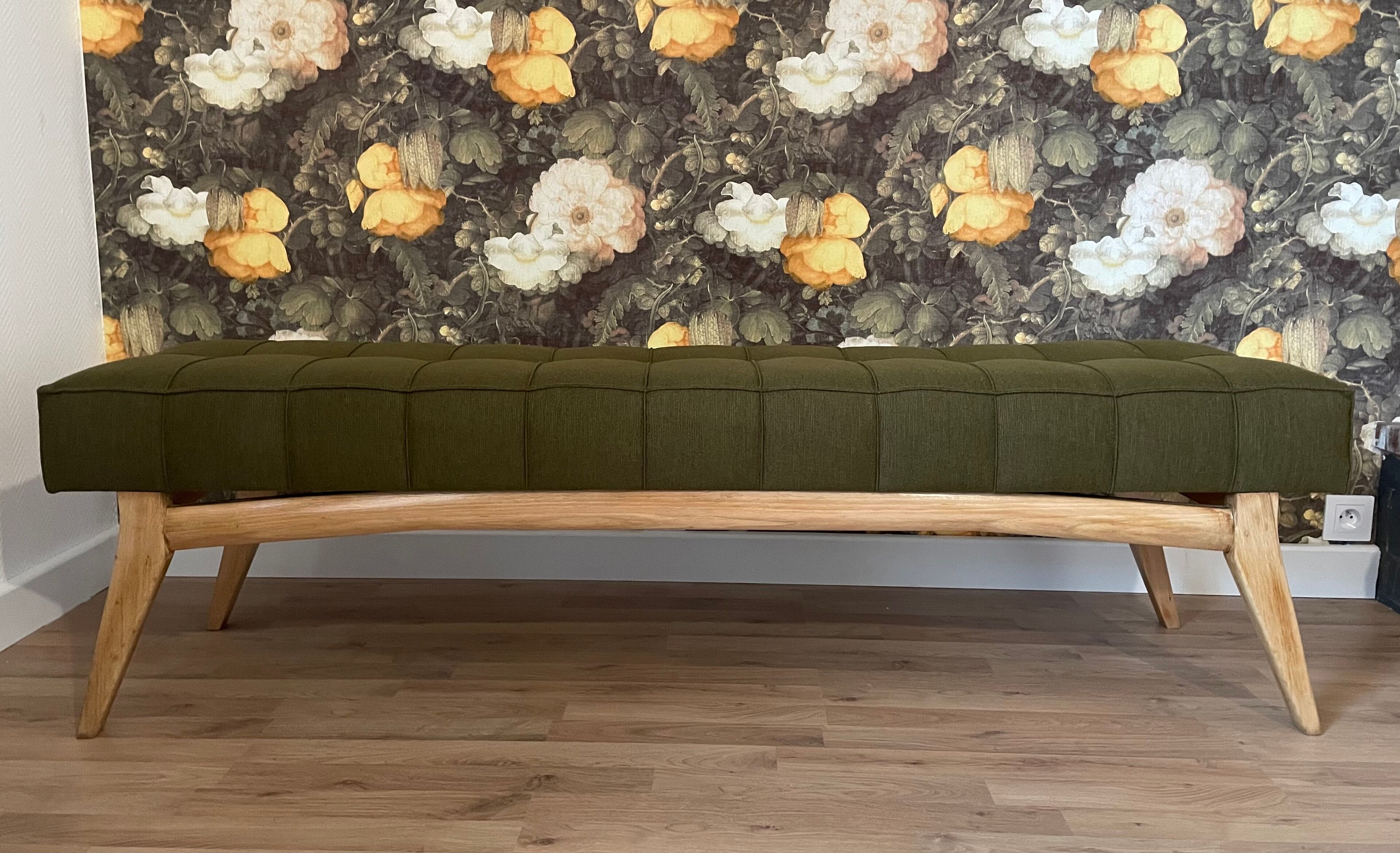 Wooden bench and green fabric