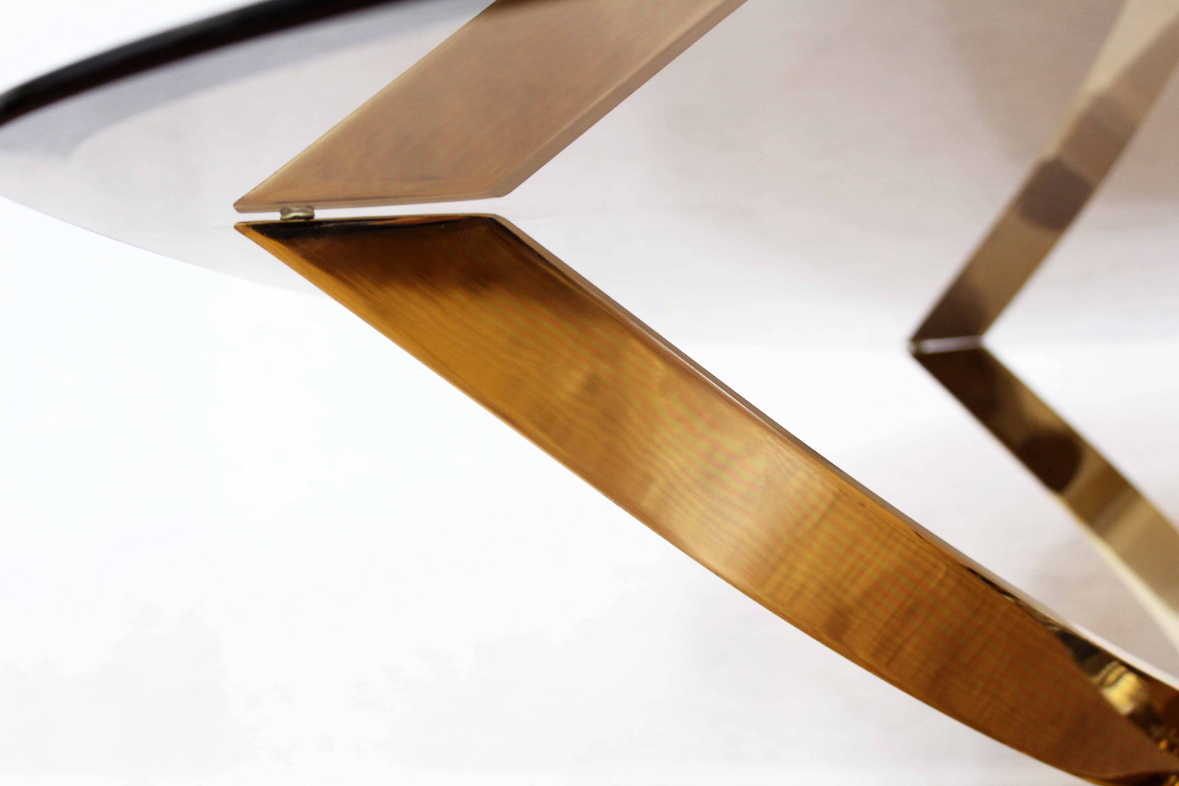 Italian coffee table in smoked glass and brass