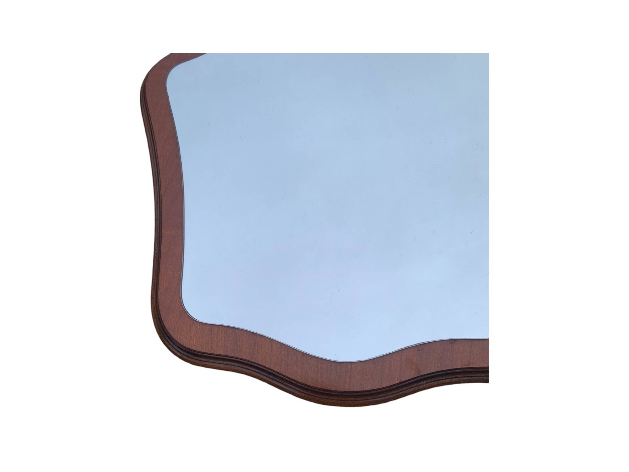 Beautiful wooden mirror with original shape