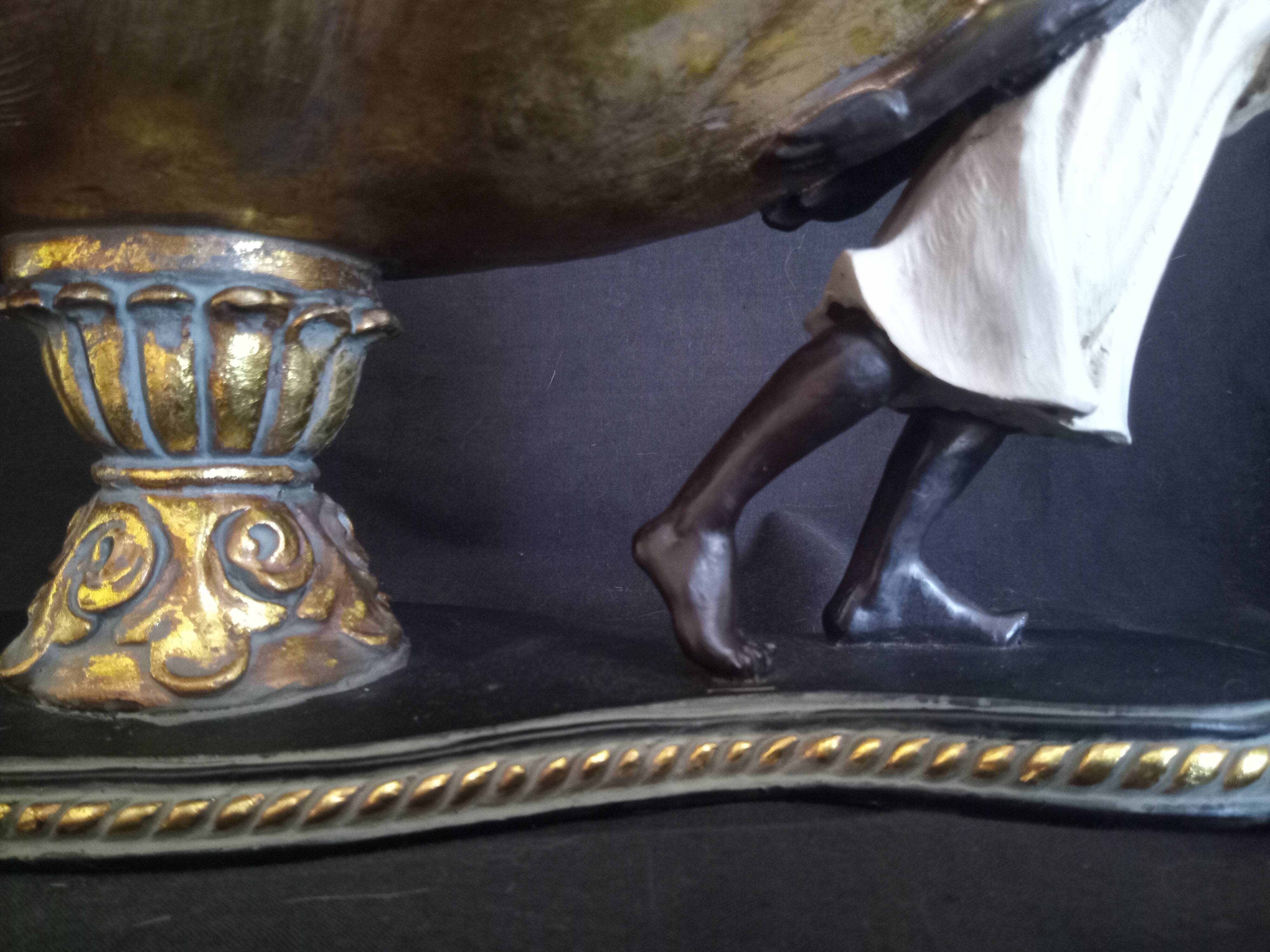 Centerpiece with African characters, plaster, resin and wood