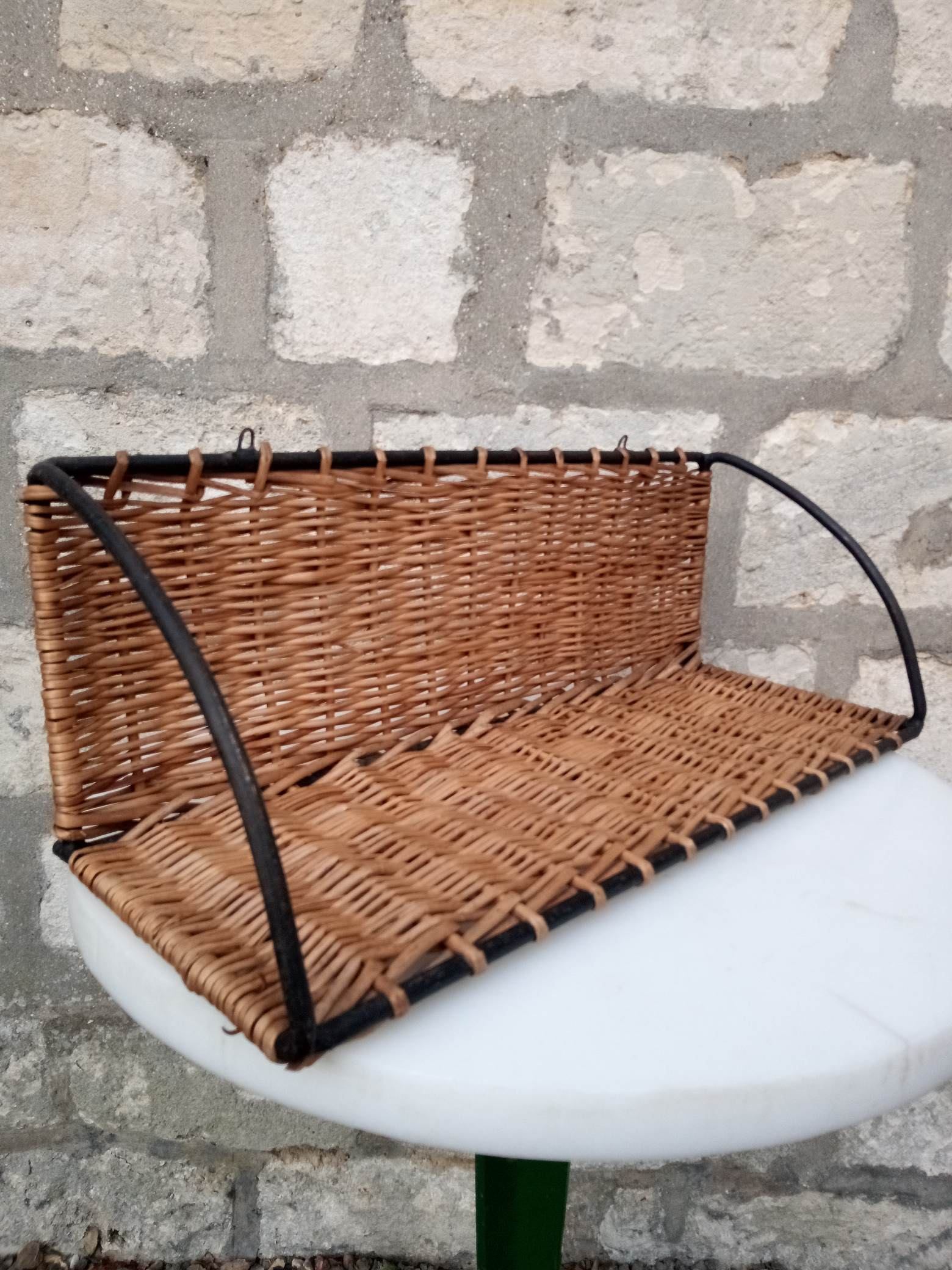 Rattan and steel shelf