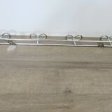 Large vintage wall-mounted coat rack in chrome metal