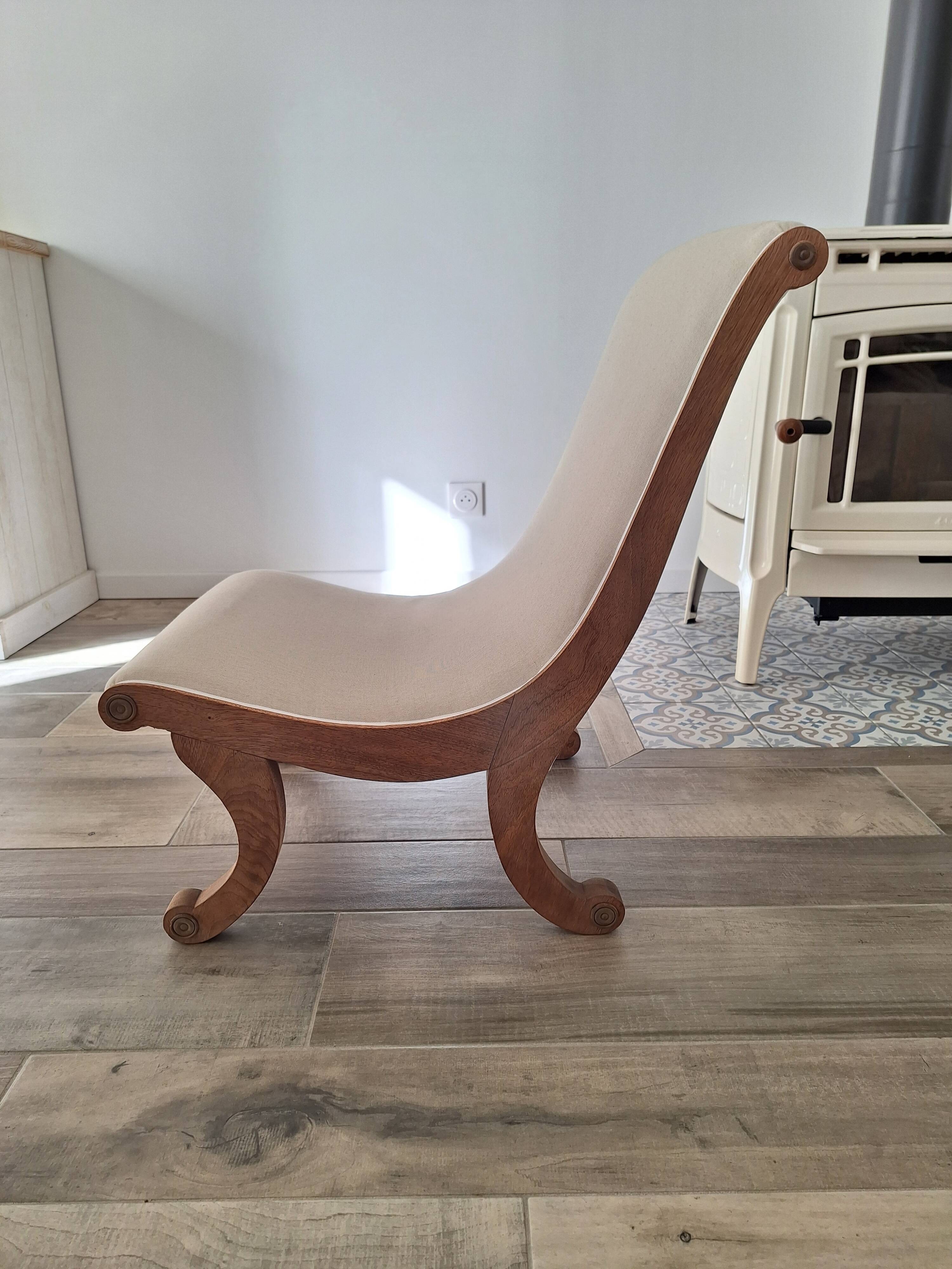 Vintage gondola armchair in beige linen fabric.