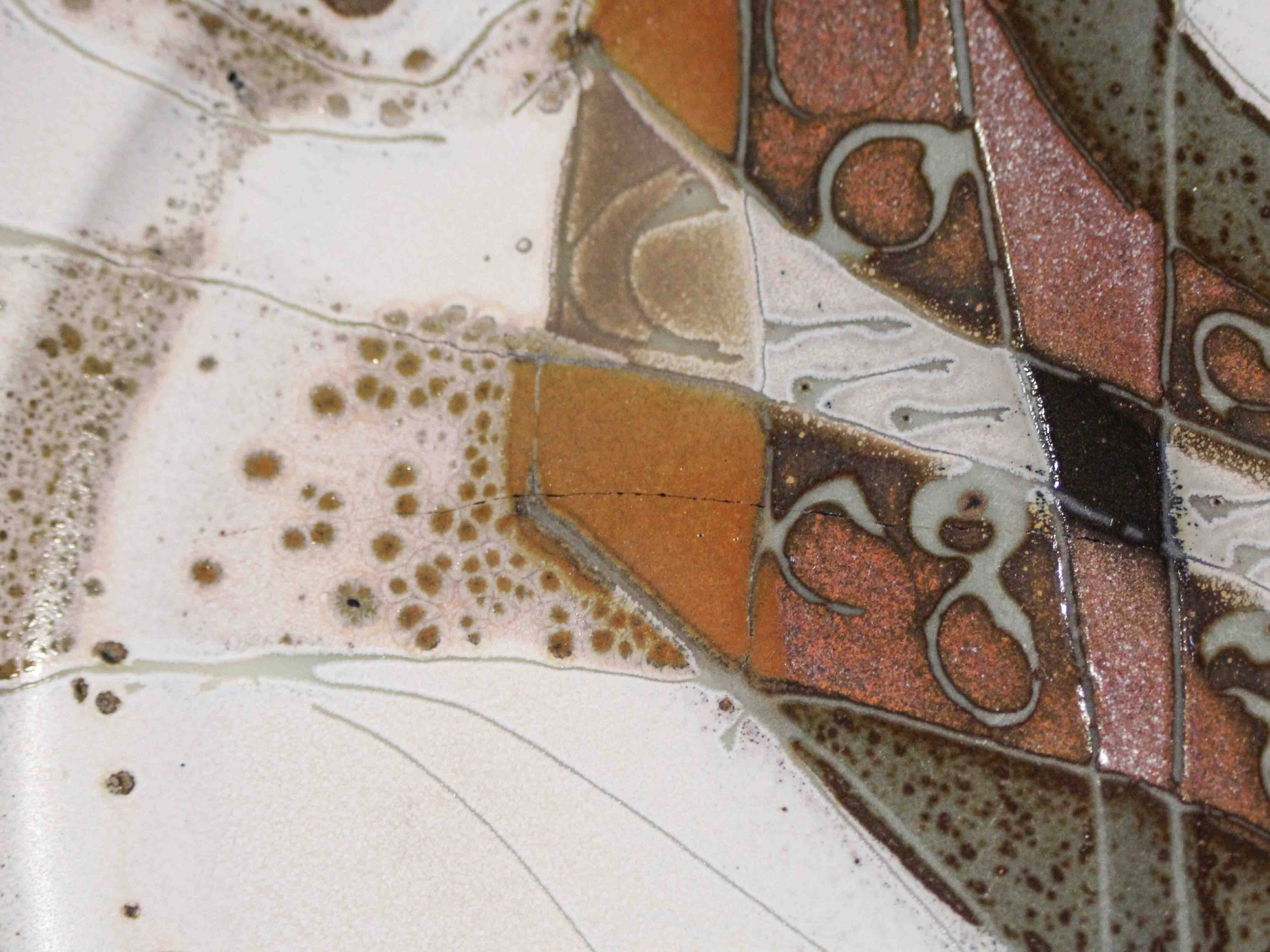 Decorative glazed stoneware plate by Patrick Rollet