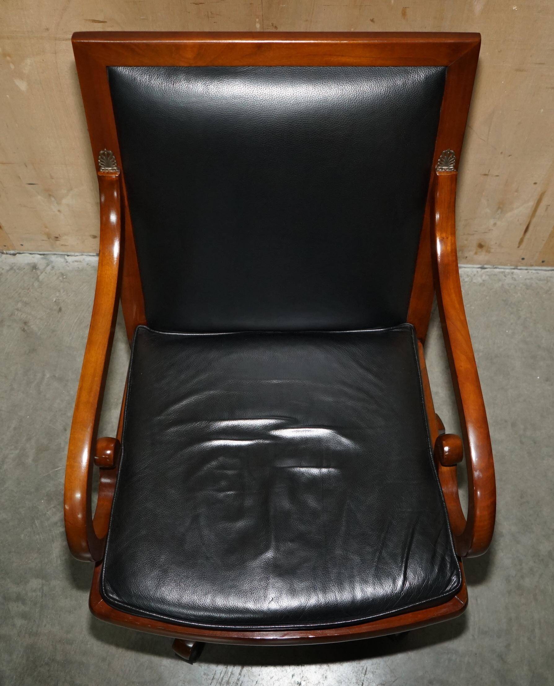 Captain's armchair in leather and cherry wood Grange Paris