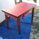 Table in red formica