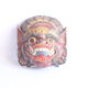 Two polychrome painted and gold leaf gilded Barong dance masks from Bali, Indonesia.