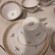 Tea/coffee cups with saucers.
