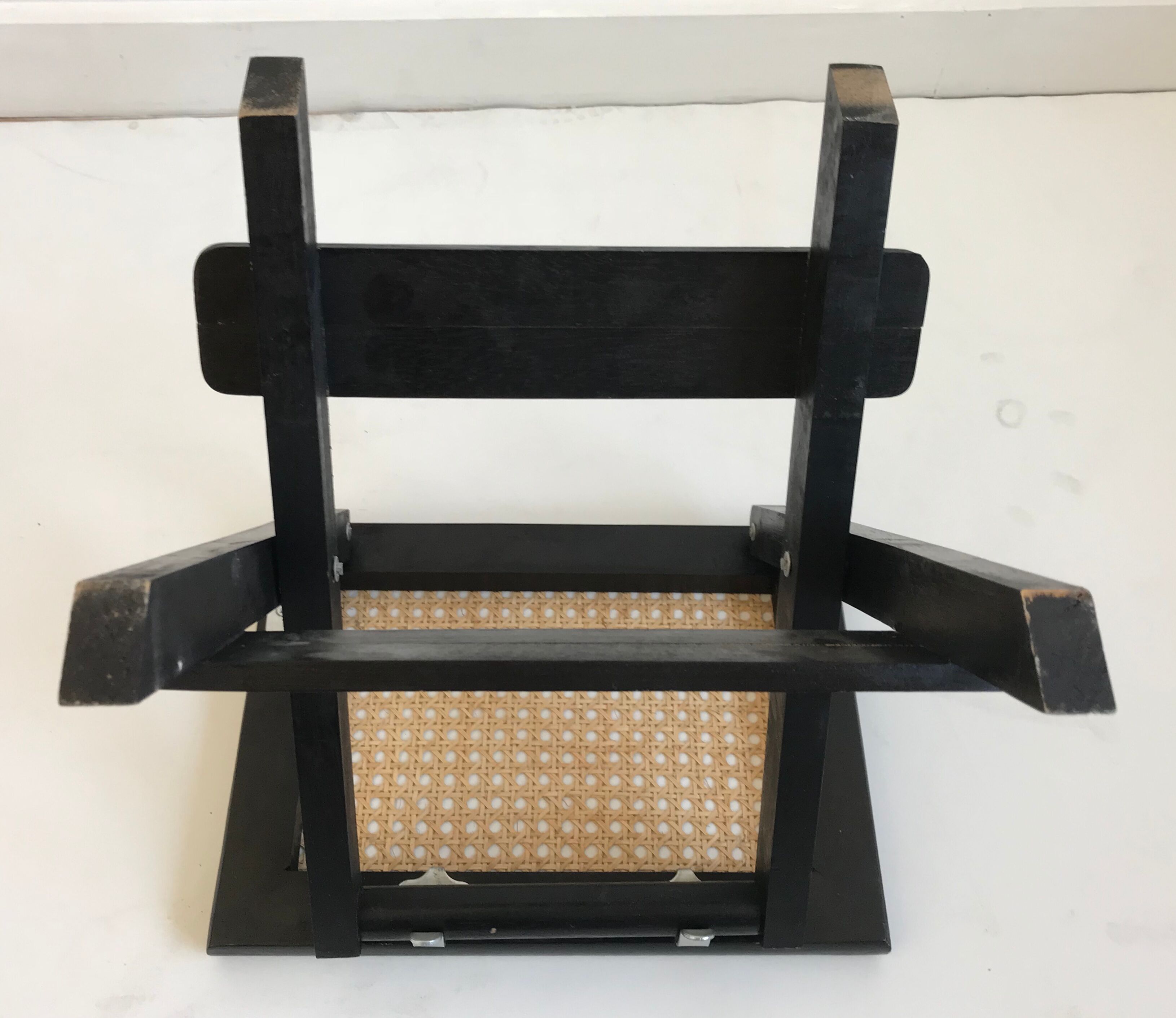 Stool in black folding caning