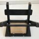 Tabouret en cannage pliant noir