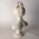 Ceramic bust of a woman after houdon