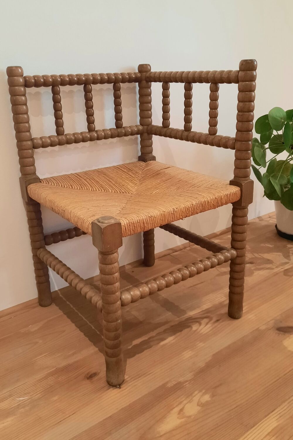 Turned wooden corner chair