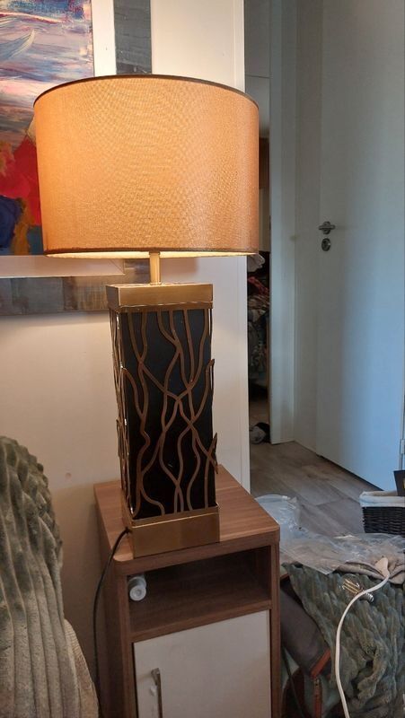 Golden and black lamp