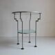 Postmodern round glass  and steel side table, 1980s.