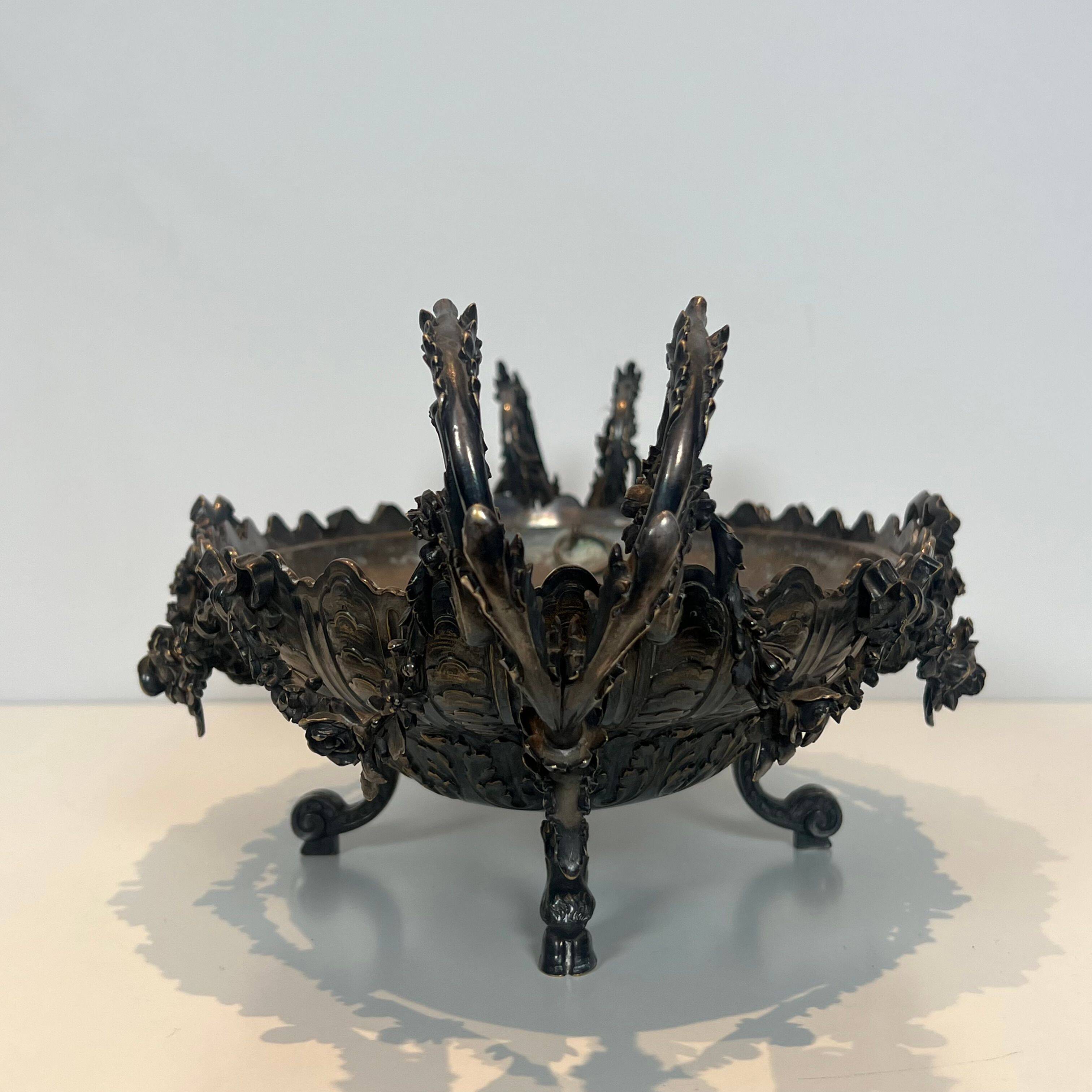 Especially a silver-plated metal table with engraving, signed.