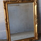 Bevelled gilded wood mirror