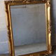 Miroir en bois doré biseauté