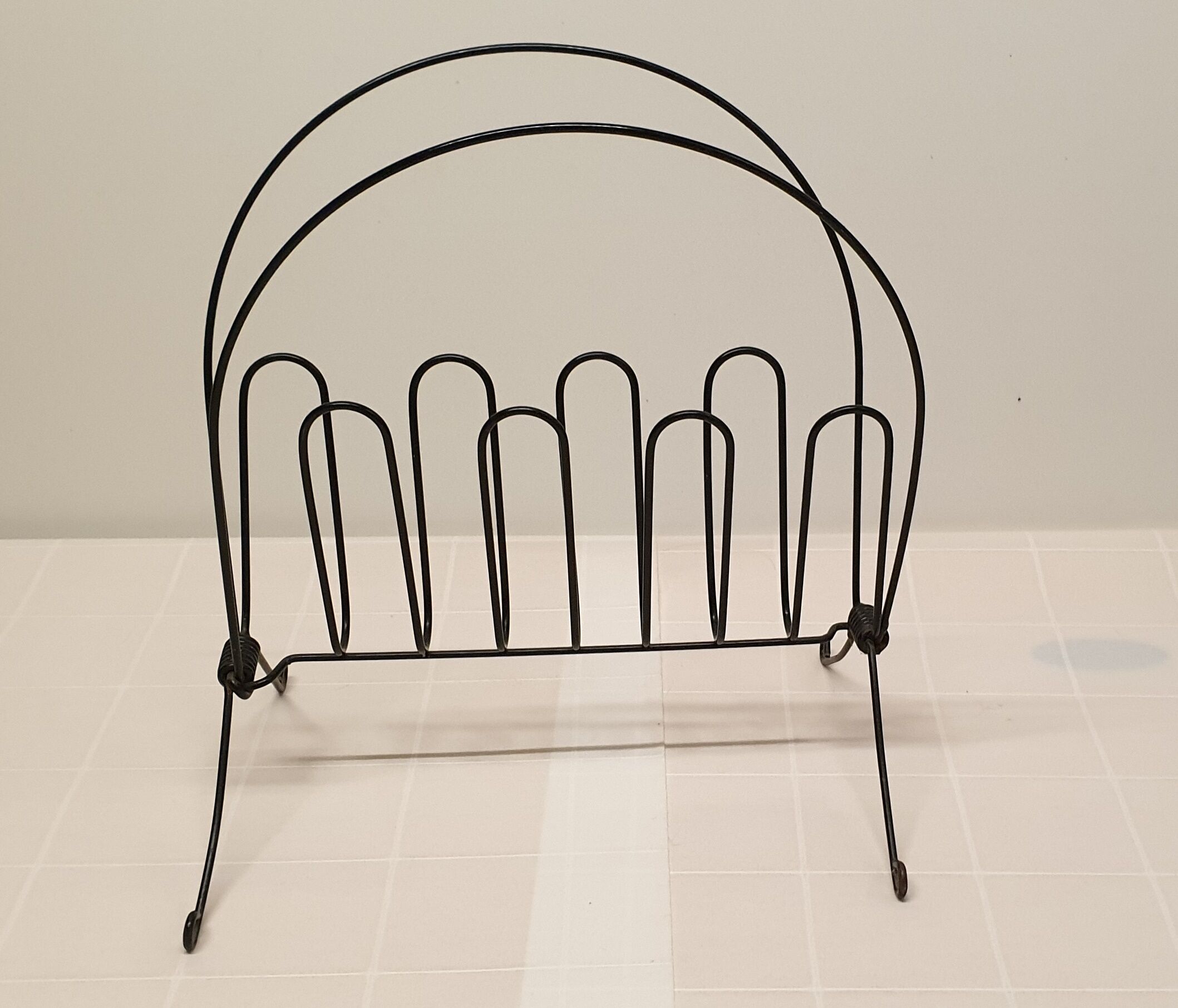 Vintage laminated metal magazine rack