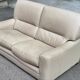 2/3-seater sofa in genuine beige leather by Roche Bobois. Very good condition, great comfort.