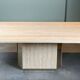 Dining table in travertine and brass. French work. Around 1970.
