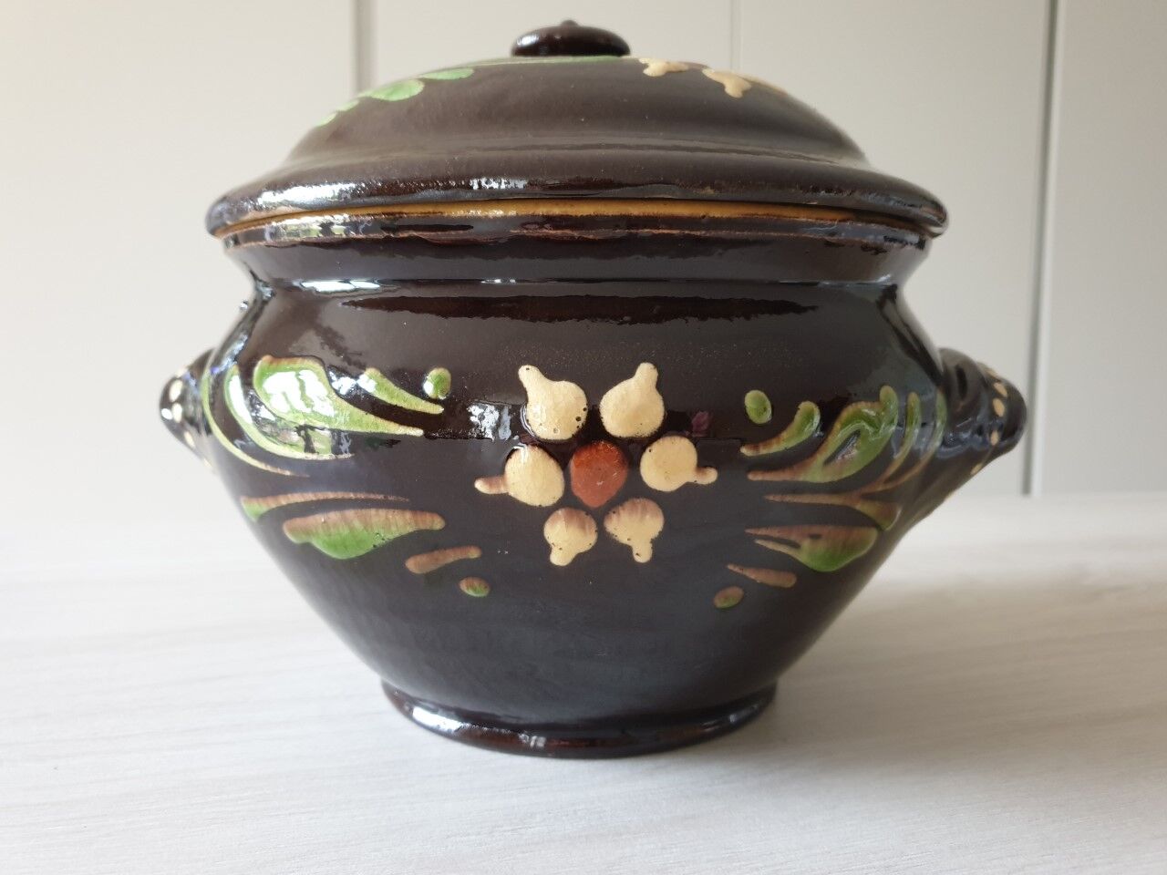 Large glazed terracotta covered pot