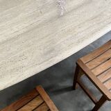 Oval travertine table