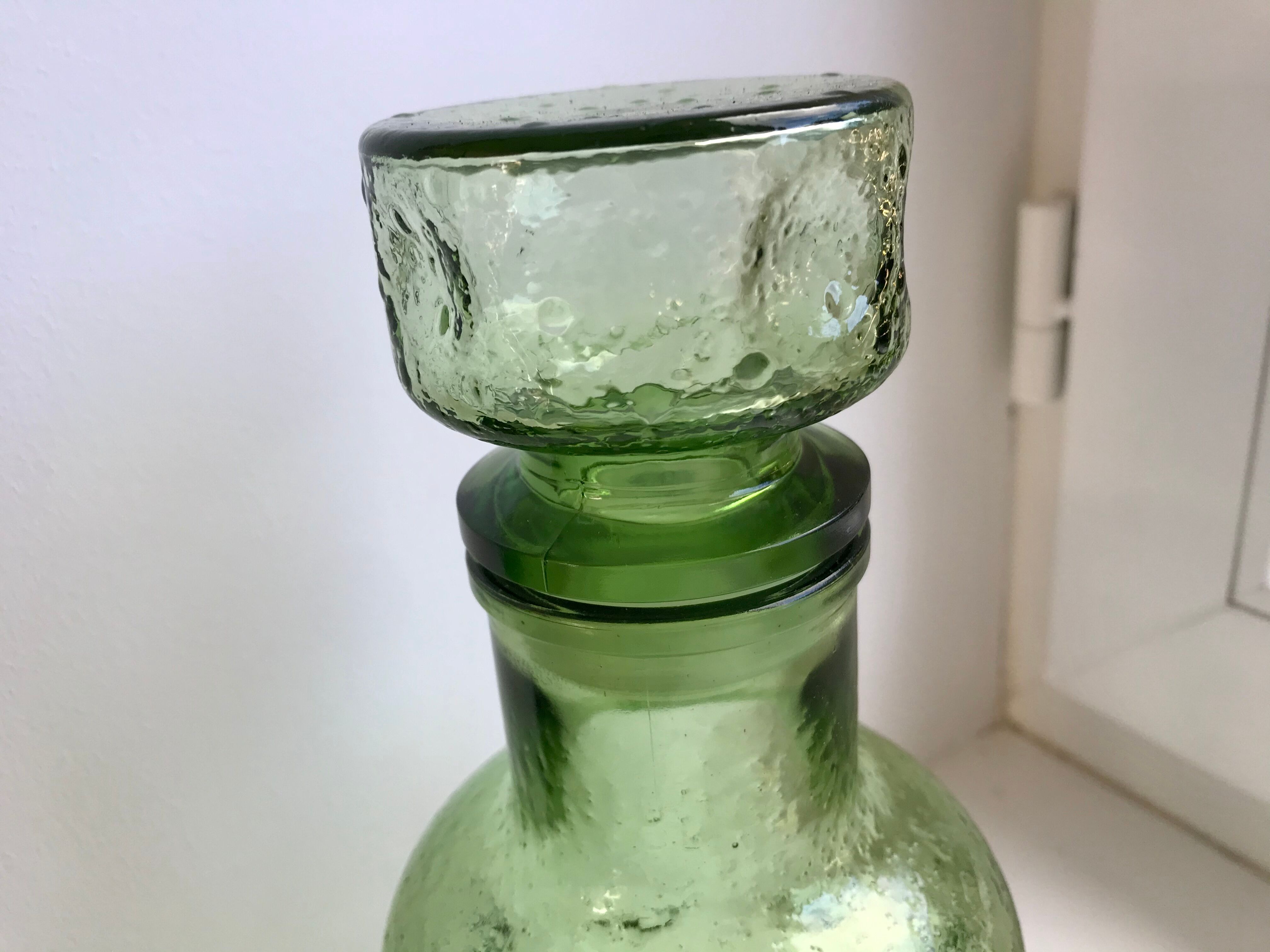 Decanter in green bubbled glass 70s