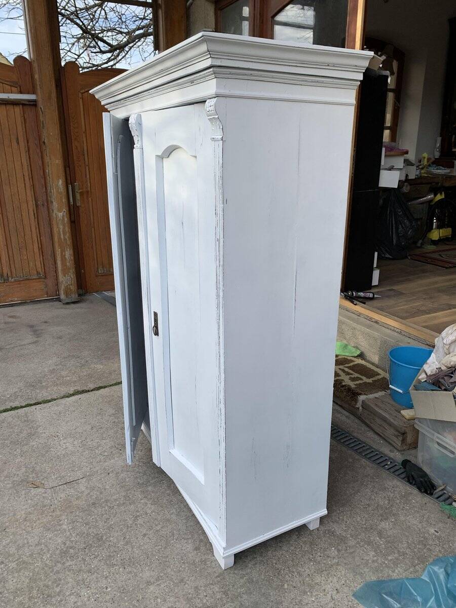 Vintage two-door wardrobe in painted white wood — late 19th century Hungarian style.