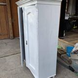 Vintage two-door wardrobe in painted white wood — late 19th century Hungarian style.